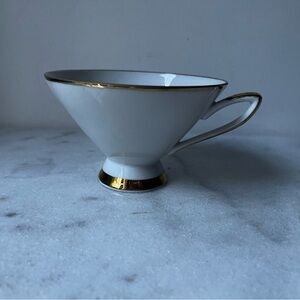 Elegant White floral Teacup with Gold Trim